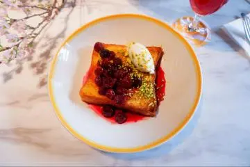 Shokupan French toast with cherry compote, mascarpone, and pistachio