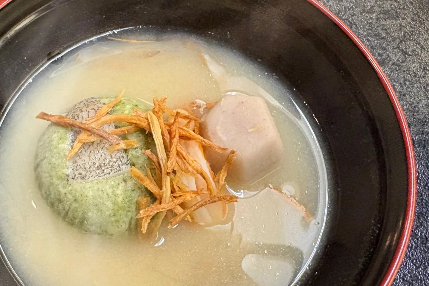 Lotus-shaped manju with white miso and burdock from the seasonal kaiseki menu