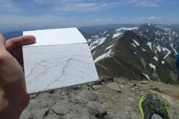 A quick sketch before conquering the ridge (Photo: Matthew Shewchuk)