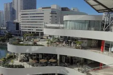 After you come out of the Central East exist of Yokohama station, go straight through the shopping area “PORTA” until you come to SOGO. Then take the escalator at SOGO up to the second floor. Follow the signs towards Bay Quarter. It takes about 7 minutes 