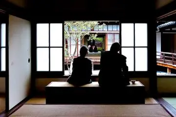 People appreciating the garden