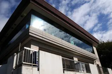 This building sits just below the tower and contains the 'Seafood Restaurant Mexico'.