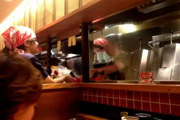 Long counter seats are intimate but with a sense of communal fun.