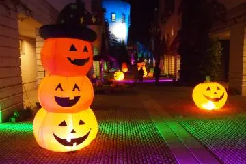 The street that is lit up for Halloween. Spooky and cute at the same time!