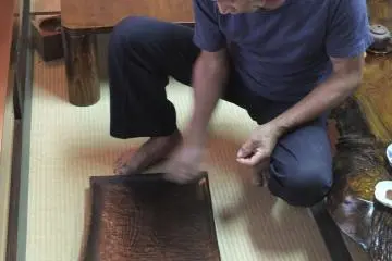 Mr. Keiichiro Kobashi does it all - cutting, carving, painting