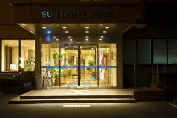 Sunhotel Tosu, main entrance at night