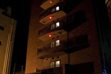 Front of Sunhotel Tosu at night