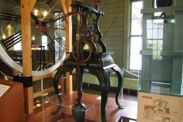 A 50-kilo stone box and 150-kilo bell are hung at the bottom of the clock, that cranks the gears and keep the clock moving over more than a century.