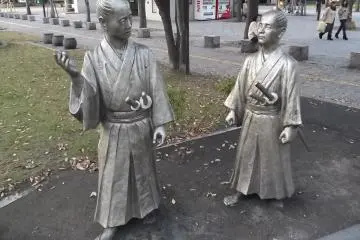 Two more samurai discuss the ramifications of a minister's recent assassination