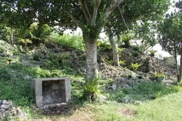 <p>There are a few shrines on the site and lots of crumbling limestone walls ringing the area</p>