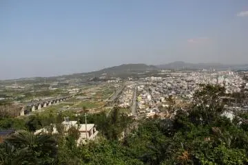 <p>The narrowest point in Okinawa is shown here; the Ishikawa district of Uruma City and Kinbu Bay are on the right while Onna Village is on the left</p>