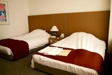 The beds, lower than usual, somehow makes it look more homey.