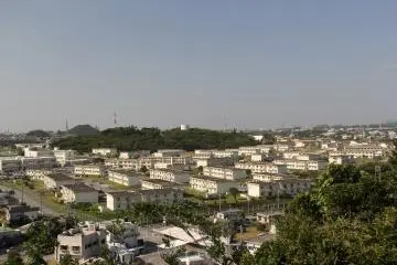 Views of nearby American military bases; this is Camp McToureous, a military family housing area