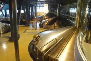 The tour, led by a guide, winds its way around parts of the factory, offering views from above through observation windows of various parts of the manufacturing process.