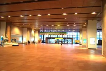 <p>The station is spacious with warm lighting.</p>