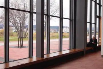 <p>The large, futuristic windows that look out to Asahikawa downtown on one side, and Kaguraku on the other.</p>
