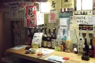 <p>The counter with most of its bottles</p>