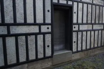 <p>Here is an outer wall of the house -&nbsp;like a fortress. Much thought and investment went into&nbsp;fire-proofing the house. The house&nbsp;stands with a certain dignity and endurance as the rest of the city changes with the times.</p>