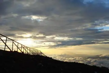 Dawn breaking on a cloudy day.