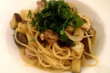 Shredded Shiso add bite and bitter counterpoint to the succulent pasta