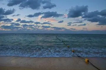 <p>Early morning walk along&nbsp;the 800 meters of natural white sand&nbsp;beach</p>