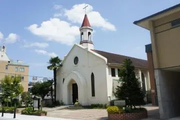 <p>Kobe Baptist Church view on a bright sunny day on the Yamate Street</p>