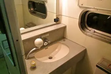 One of the washrooms. The mirrors on the Moonlight Echigo are bigger than the ones I remember from day running express trains and all the washrooms struck me as cleaner than those on day trains as well.