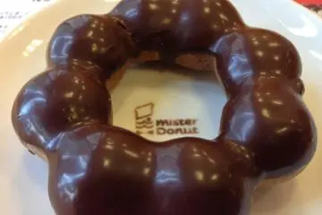 Ponde rings, like the chocolate covered cake donut shown here, is Mister Donut's most popular product