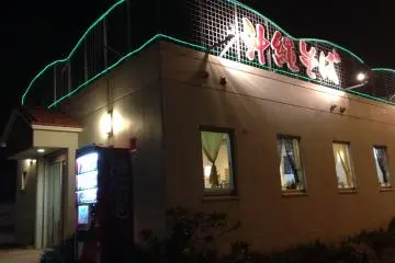 <p>Ichintouya as seen at night from Route 74 in Okinawa City</p>