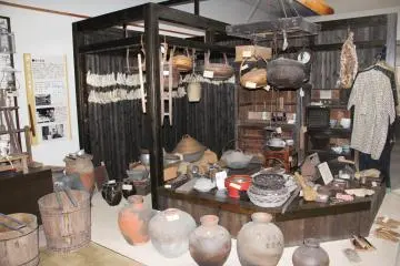 <p>Urns and lower jawbones and baskets and shoes</p>