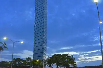 <p>The blue sky reflecting from the walls of the tower nearly make it a see-through transparent experience.</p>