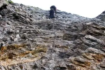 Ascending with chains in the Japanese Alps in Nagano Prefecture