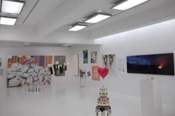 <p>The art is on the walls, on the floor, and hangs from the ceiling</p>