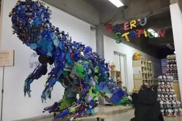 <p>A big blue scrap metal dinosaur</p>