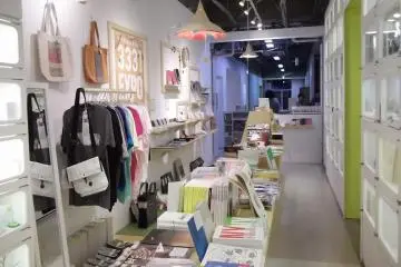 <p>Goods and shirts for sale</p>