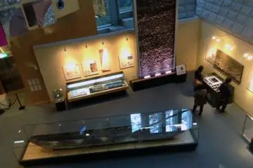 <p>A view of the first exhibition room from above. The museum takes visitors through a chronological history of the local area, starting way back in the Jomon era!</p>