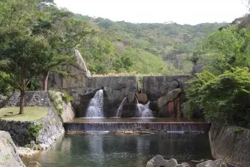 <p>This mini man-made waterfall marks the end of the camping area and the beginning of the nature trail to Hiji Falls</p>