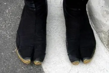 <p>Also, a photo taken 11 years ago in Kyoto of a rickshaw driver's feet. At the time, I was fascinated with the rickshaw drivers'&nbsp;uniform, especially these&nbsp;toed boots, a precursor to the Adidas toed runner</p>