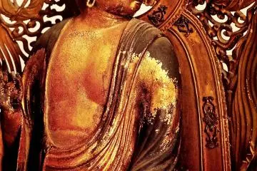 <p>พระอมิตาภพุทธะกำลังหันหน้ามองข้ามหัวไหล่มาที่ Eikan&nbsp;(จากแผ่นพับที่เล่าเรื่องราวของ Eikando)</p>