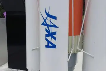 The JAXA&nbsp;(Japan Aerospace Exploration Agency) logo on the side of some engine boosters.