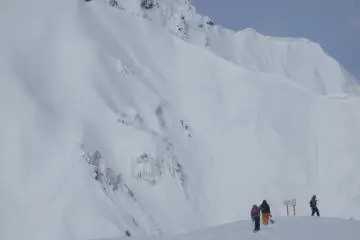 <p>Exiting the safety of the ski resort for fresh powder</p>