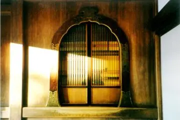 <p>The soft glow of sunlight over the door frame</p>