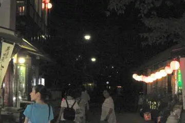 Tourists strolling down the Uji Riverside Walk