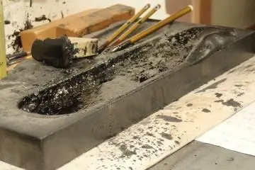 <p>Close up of ink well</p>