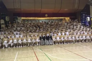 <p>A group photo of the local education board. Since several years ago, foreign English teachers have also been allowed to march with this group.&nbsp;</p>