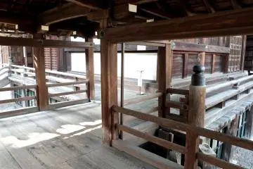 <p>The temple buildings are connected by a covered wooden walkway</p>