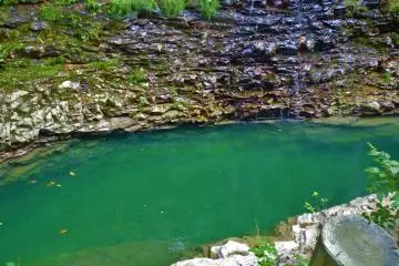 Emerald green water found along the hiking path inside the gorge