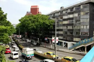 <p>7. Head SE on the overpass and you will see what appears to be some geometric like buildings from the Tokyo Olympics called Coop Olympia</p>