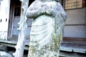 <p>In front of the temple building</p>