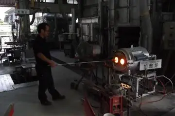 <p>In the glassware factory</p>